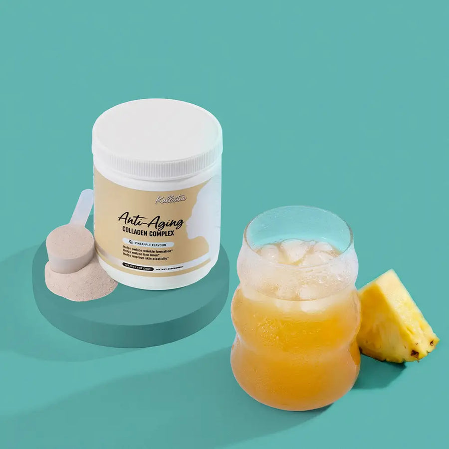 Kallistia Anti-Aging Collagen Complex pineapple flavour collagen drink served over ice with fresh pineapple